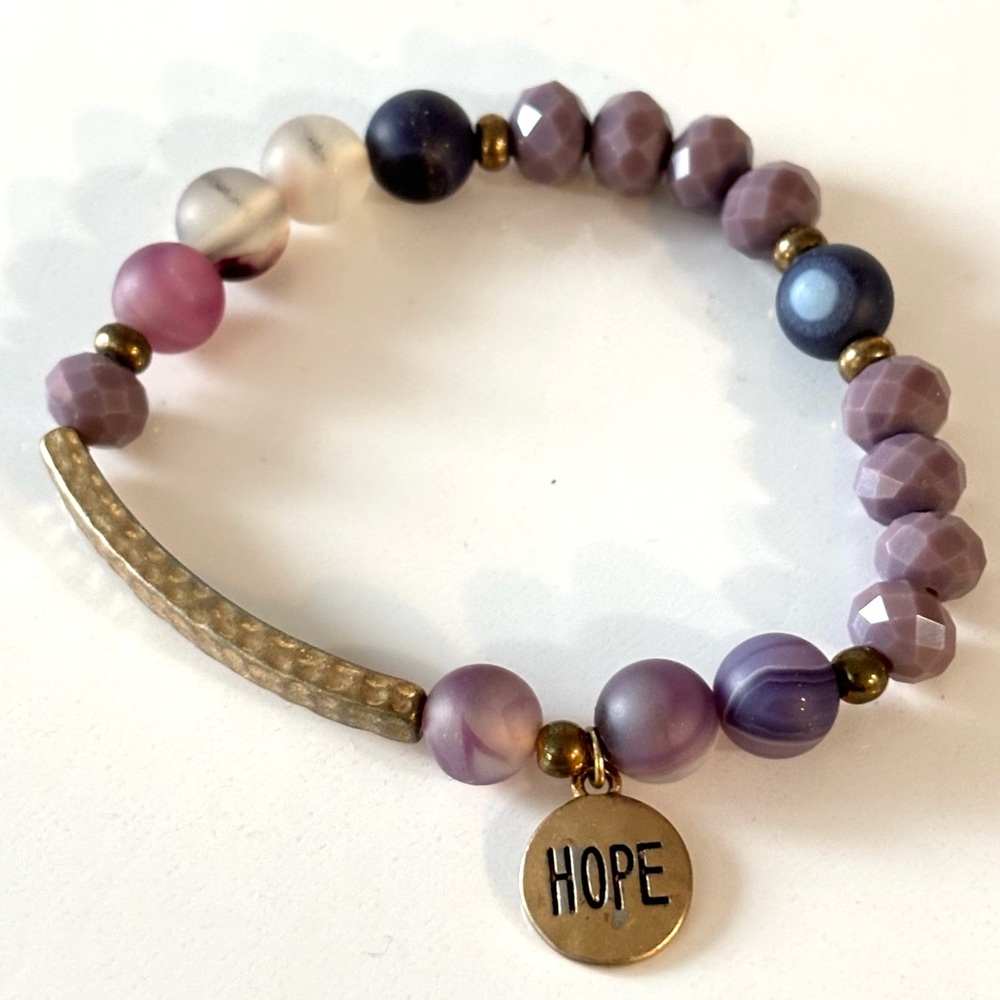 🌷5/25$ HOPE" charm, amethyst bracelet used for cancer awareness.